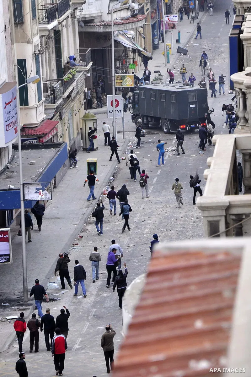 Anti-government demonstrators march in Alexandria, Egypt, Jan. 28, 2011. Egyptian President Hosni Mubarak defied a quarter-million protesters demanding he step down immediately, announcing he would serve out the last mon...