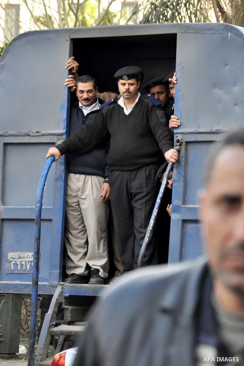 Egyptian police stand guard during fresh demonstrations that erupted following Friday prayers in Alexandria, Egypt, Jan. 28, 2011. Violent clashes marked a 'Friday of rage' in Egypt, as anti-government protesters sought...