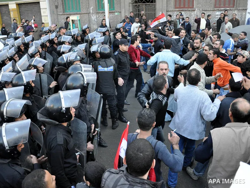 Anti-government demonstrators take part in a protest in Alexandria, Egypt, Jan. 25, 2011. Egyptian President Hosni Mubarak defied a quarter-million protesters demanding he step down immediately, announcing he would serve...