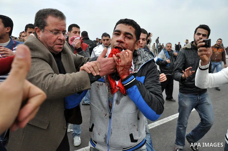 A wounded Egyptian anti-government demonstrator during clash with anti-riot police during fresh demonstrations that erupted following Friday prayers in in Alexandria, Egypt, 28 January 2011. Violent clashes marked a 'Fri...