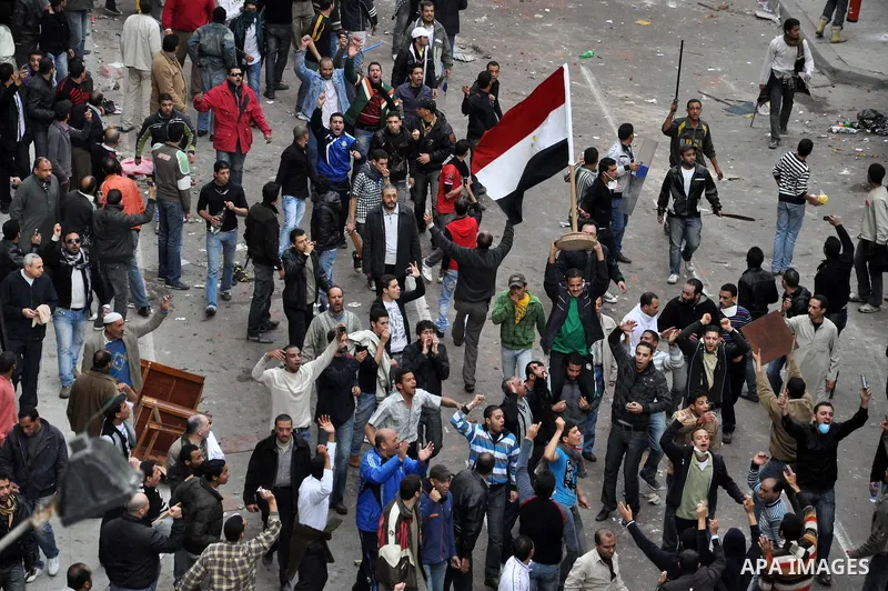 Egyptian anti-government demonstrators during clashes that erupted following Friday prayers in in Alexandria, Egypt, 28 January 2011. Violent clashes marked a 'Friday of rage' in Egypt, as anti-government protesters soug...