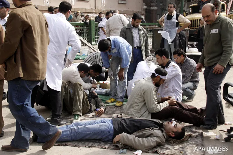Egyptian pro government protesters throw stones at anti government protesters in downtown Cairo, Egypt, Thursday, Feb. 3, 2011. New clashes are heating up again and shots are being fired in the air around Cairo's central...