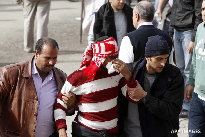 Egyptian protesters are seen in and around Tahrir square, as supporters and opponents of President Hosni Mubarak clash in some parts of the square, Cairo, capital of Egypt, Feb. 3, 2011. Egyptian army appeared to be tryi...