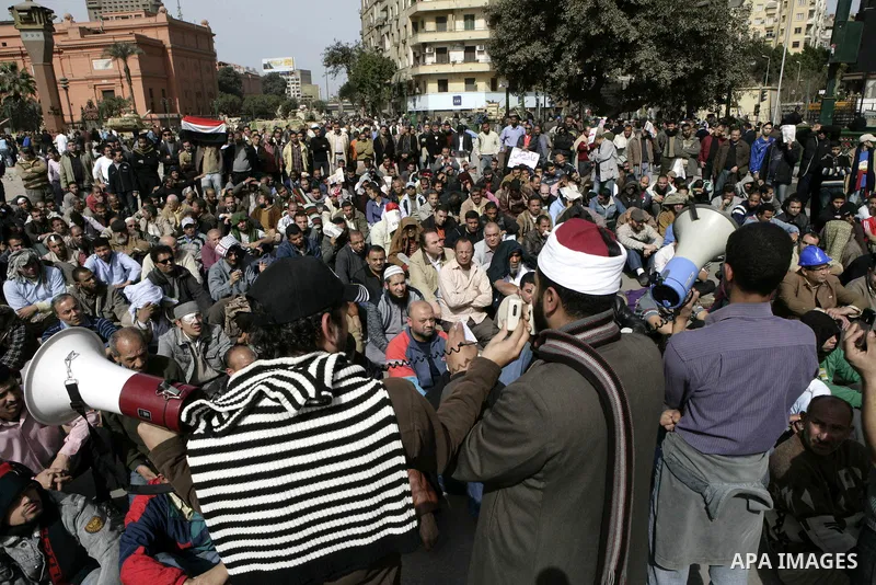 Protestors gather at Tahrir Square, Cairo, Egypt, Feb. 4, 2011. Egyptian minister of Health said Friday that about five thousand people have been injured since Jan. 25, and eight have been killed in clashes between prote...