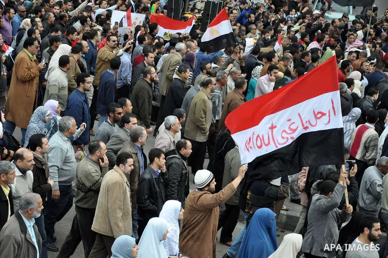 Egyptian protester shouts anti-Mubarak slogans during a protest in the Mediterranean sea city of Alexandria, Egypt, Friday, Feb. 4, 2011. Tens of thousands packed central Cairo Friday, waving flags and singing the nation...