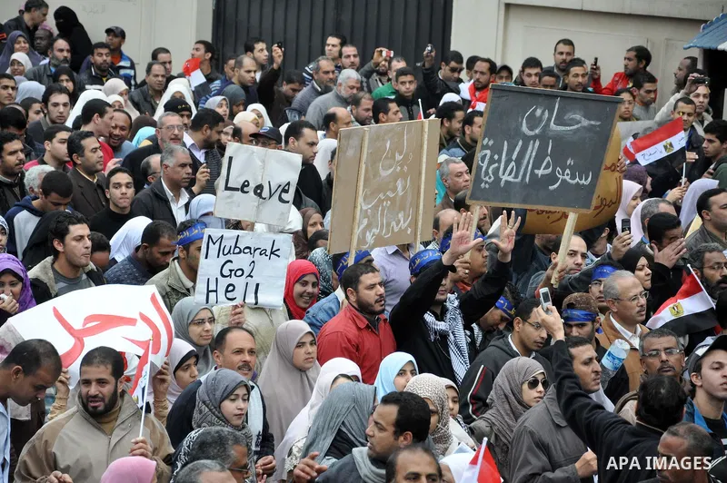 Egyptian protester shouts anti-Mubarak slogans during a protest in the Mediterranean sea city of Alexandria, Egypt, Friday, Feb. 4, 2011. Tens of thousands packed central Cairo Friday, waving flags and singing the nation...
