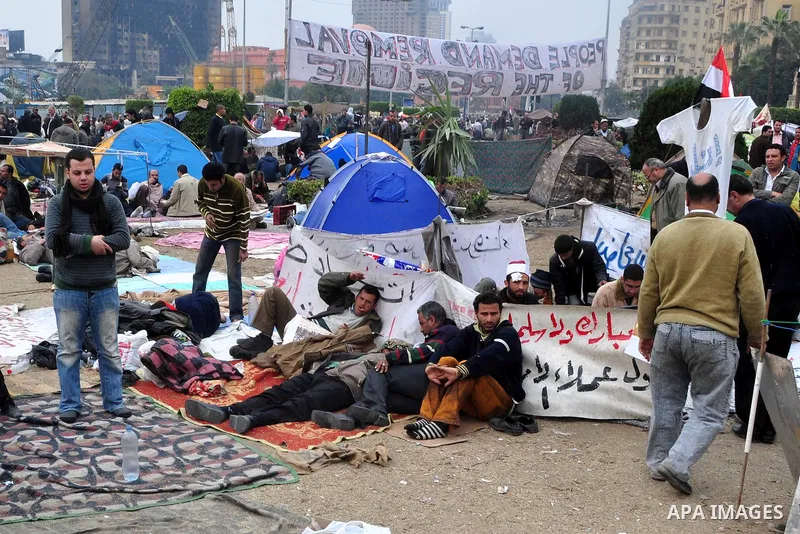 Anti-government protestors camp in Tahrir Square, Cairo, Egypt, Saturday, Feb. 5, 2011. President Barack Obama said Egypt's Hosni Mubarak should do the statesmanlike thing and make a quick handoff to a more representativ...