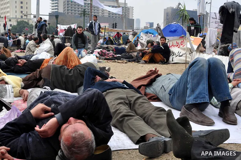 Anti-government protestors camp in Tahrir Square, Cairo, Egypt, Saturday, Feb. 5, 2011. President Barack Obama said Egypt's Hosni Mubarak should do the statesmanlike thing and make a quick handoff to a more representativ...