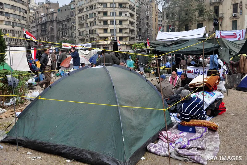 Anti-government protestors camp in Tahrir Square, Cairo, Egypt, Saturday, Feb. 5, 2011. President Barack Obama said Egypt's Hosni Mubarak should do the statesmanlike thing and make a quick handoff to a more representativ...