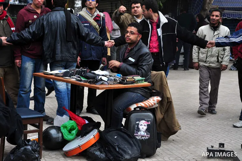 Egyptian anti-Mubarak protesters take part in a protest in Cairo, Egypt, Saturday, Feb. 5, 2011. President Barack Obama said Egypt's Hosni Mubarak should do the statesmanlike thing and make a quick handoff to a more repr...