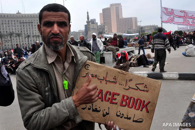 Egyptian anti-Mubarak protesters take part in a protest in Cairo, Egypt, Saturday, Feb. 5, 2011. President Barack Obama said Egypt's Hosni Mubarak should do the statesmanlike thing and make a quick handoff to a more repr...