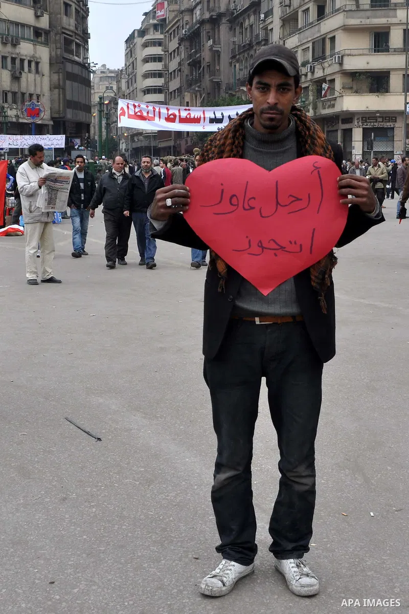 Egyptian anti-Mubarak protesters take part in a protest in Cairo, Egypt, Saturday, Feb. 5, 2011. President Barack Obama said Egypt's Hosni Mubarak should do the statesmanlike thing and make a quick handoff to a more repr...