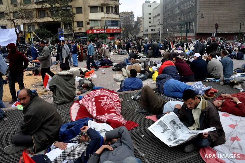 Anti-government protestors camp in Tahrir Square, Cairo, Egypt, Saturday, Feb. 5, 2011. President Barack Obama said Egypt's Hosni Mubarak should do the statesmanlike thing and make a quick handoff to a more representativ...