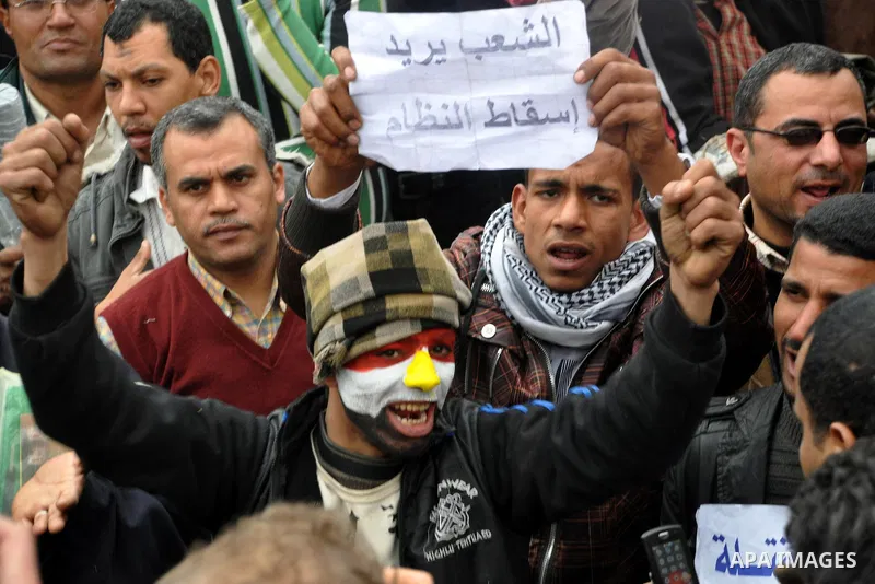 Egyptian anti-Mubarak protesters take part in a protest in Cairo, Egypt, Saturday, Feb. 5, 2011. President Barack Obama said Egypt's Hosni Mubarak should do the statesmanlike thing and make a quick handoff to a more repr...