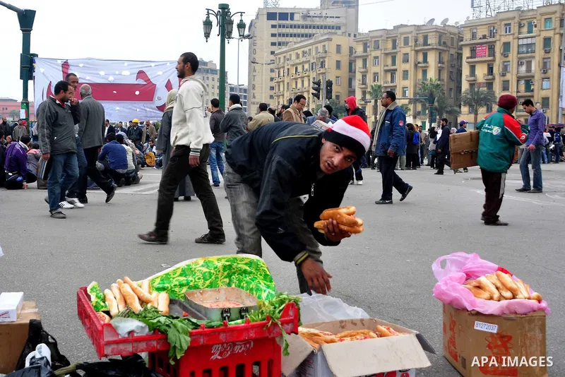 Egyptian anti-Mubarak protesters take part in a protest in Cairo, Egypt, Saturday, Feb. 5, 2011. President Barack Obama said Egypt's Hosni Mubarak should do the statesmanlike thing and make a quick handoff to a more repr...