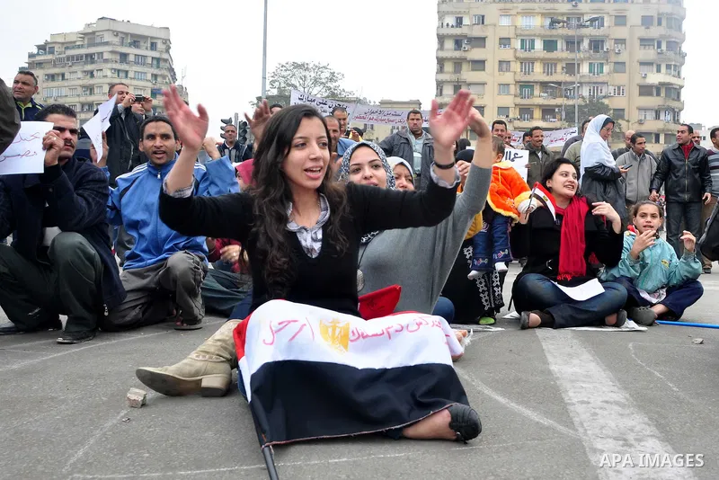 Egyptian anti-Mubarak protesters take part in a protest in Cairo, Egypt, Saturday, Feb. 5, 2011. President Barack Obama said Egypt's Hosni Mubarak should do the statesmanlike thing and make a quick handoff to a more repr...