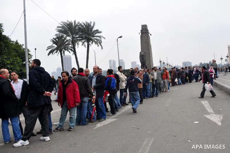 Egyptian anti-Mubarak protesters take part in a protest in Cairo, Egypt, Saturday, Feb. 5, 2011. President Barack Obama said Egypt's Hosni Mubarak should do the statesmanlike thing and make a quick handoff to a more repr...