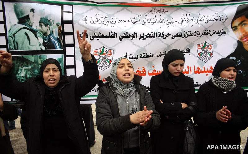 Palestinian protestors take part in a demonstration against the Israeli controversial separation barrier in the West Bank village of Beit Omar, near Hebron, 05 February 2011. Israel says the network of steel and concrete...