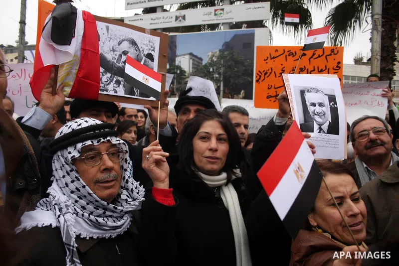 Palestinians demonstrate during a rally to show solidarity with anti-Mubarak protestors in Egypt, during a demonstration in the West Bank city of Ramallah, Saturday, Feb. 5, 2011. Photo by Issam Rimawi