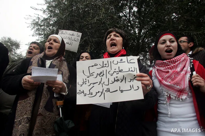 Palestinians demonstrate during a rally to show solidarity with anti-Mubarak protestors in Egypt, in the old city of Jerusalem on Feb. 5,2011. Photo by Mahfouz Abu Turk