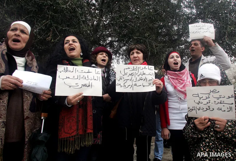 Palestinians demonstrate during a rally to show solidarity with anti-Mubarak protestors in Egypt, in the old city of Jerusalem on Feb. 5,2011. Photo by Mahfouz Abu Turk