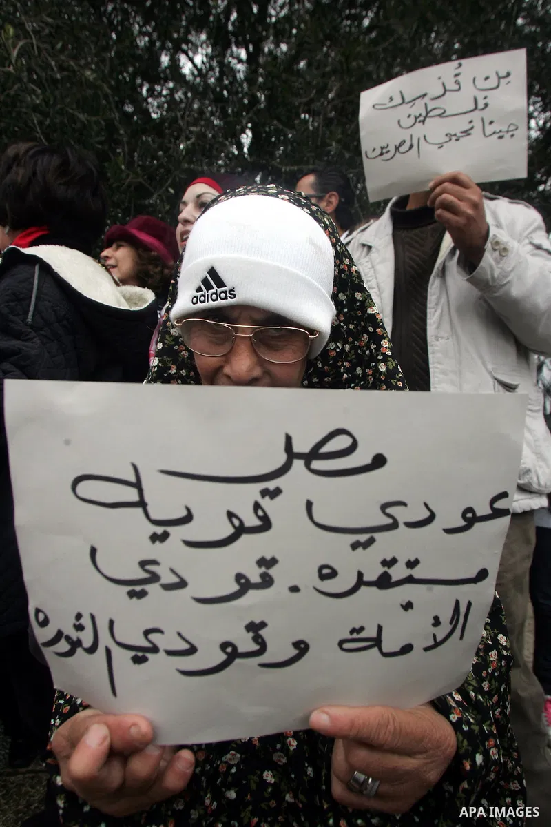 Palestinians demonstrate during a rally to show solidarity with anti-Mubarak protestors in Egypt, in the old city of Jerusalem on Feb. 5,2011. Photo by Mahfouz Abu Turk