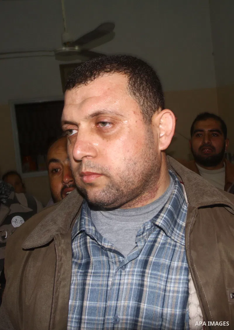 Ayman Nofal , a top Hamas armed commander, is greeted by Hamas supporters and his relatives upon his arrival to his home in Nusairat in the Central Gaza strip February 5, 2011. A senior Hamas commander returned to the Ga...