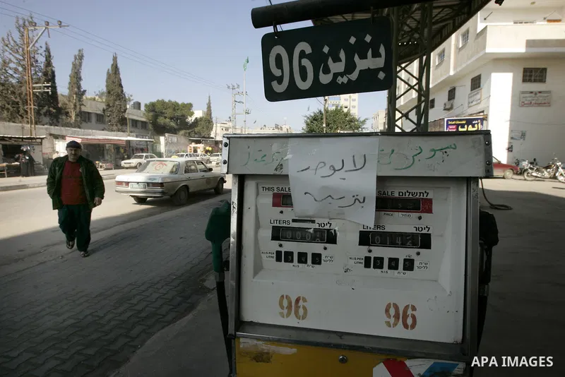 A Palestinian man walks in a petrol station in Rafah, southern Gaza Strip on February, 06, 2011. Fuel stations in the Gaza Strip free of fuel, due to suspension of the fuel line through border tunnels between Egypt and G...