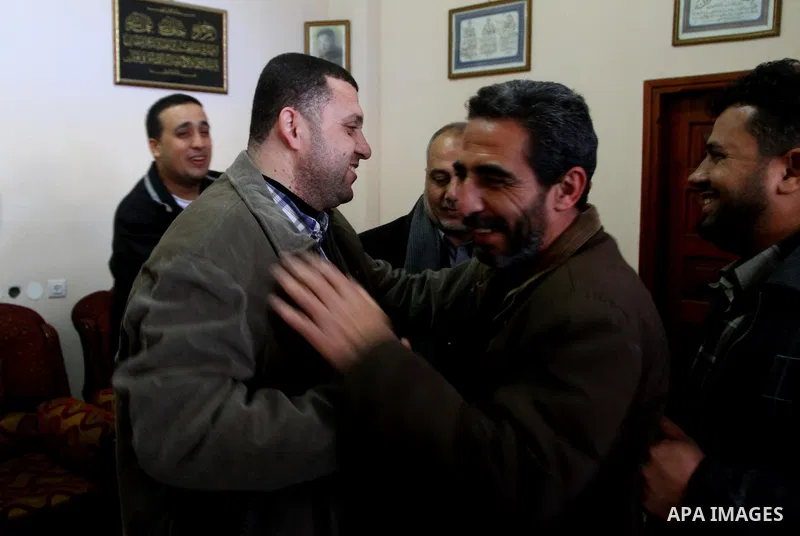 Ayman Nofal , a top Hamas armed commander, is greeted by his relatives at his home in Nusairat in the Central Gaza strip February 6, 2011. A senior Hamas commander returned to the Gaza Strip on Saturday after breaking ou...