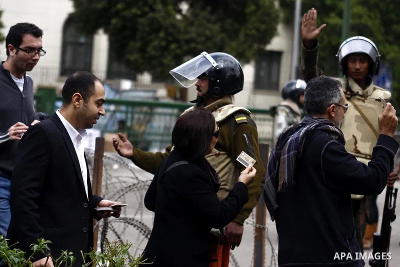 Egyptian soldiers stand guards at Tahrir Square in Cairo Feb. 6, 2011. Demonstrators camped out in Cairo's Tahrir Square, which has become an epicentre for protest, vowed to intensify their battle to oust Egypt's Preside...