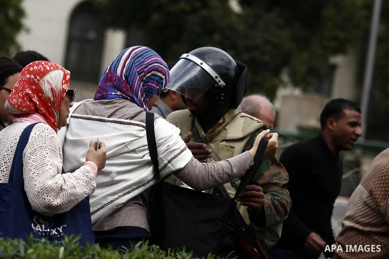 Egyptian soldiers stand guards at Tahrir Square in Cairo Feb. 6, 2011. Demonstrators camped out in Cairo's Tahrir Square, which has become an epicentre for protest, vowed to intensify their battle to oust Egypt's Preside...