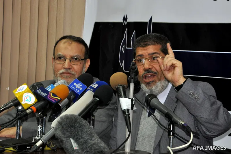 Egyptian Muslim Brotherhood spokesman Mohamed Morsi talks during a press conference in Cairo, Egypt, Sunday, Feb. 6, 2011. Egypt's largest opposition group, the Muslim Brotherhood, said it would begin talks Sunday with t...