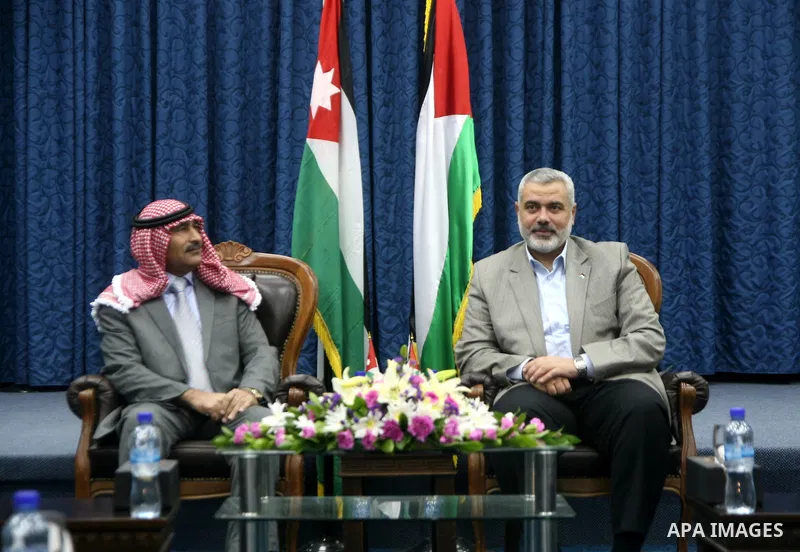 Palestinian Prime Minister in Gaza Strip, Ismail Haniyeh meets with a Jordanian delegation at his office in Gaza city on Feb. 7,2011. Photo by Ali Jadallah
