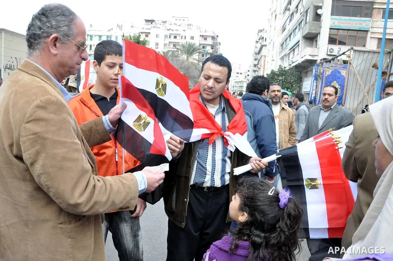 Egyptian protesters take part in a protest called 'Sunday of the martyrs' in Alexandria, Egypt, 06 February 2011. Anti-government protests entered its 13th straight day in Egypt, as solutions were being mulled to bring a...