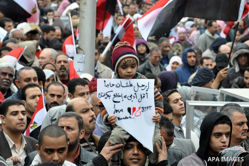 Egyptian protesters take part in a protest called 'Sunday of the martyrs' in Alexandria, Egypt, 06 February 2011. Anti-government protests entered its 13th straight day in Egypt, as solutions were being mulled to bring a...