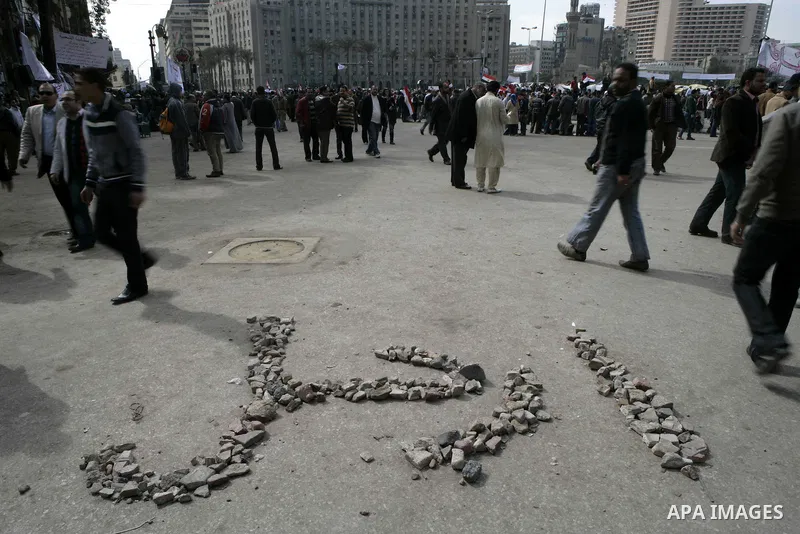 Egyptian anti-government protesters demonstrate in Tahrir Square in Cairo, Egypt, Monday, Feb. 7, 2011. The protests, which saw tens of thousands of people massing daily in downtown Cairo for demonstrations that at times...