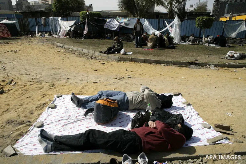 Egyptian anti-government protesters sleep in Tahrir Square in Cairo, Egypt, Monday, Feb. 7, 2011. The protests, which saw tens of thousands of people massing daily in downtown Cairo for demonstrations that at times turne...
