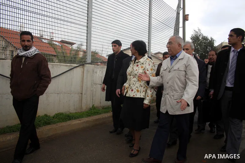 U.N. High Commissioner for Human Rights Navi Pillay and Palestinian prime minister Salam Fayyad visit the Sabri Gareeb Palestinian family home which is situated in the center of the settlement just south of Ramallah in t...