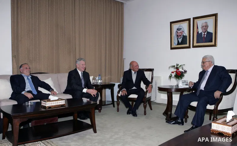 Palestinian President Mahmoud Abbas during a meeting with the Chairman of the Centre for Peace in the Middle East, Daniel Abraham in the West Bank city of Ramallah, on Feb. 7, 2011. photo by Thaer Ganaim