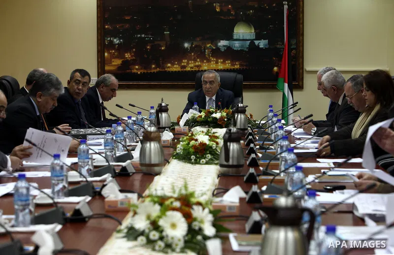 Palestinian Prime Minister Salam Fayyad heads the Palestinian cabinet meeting in the West Bank city of Ramallah on Feb. 8,2011. Photo by Mustafa Abu Dayeh