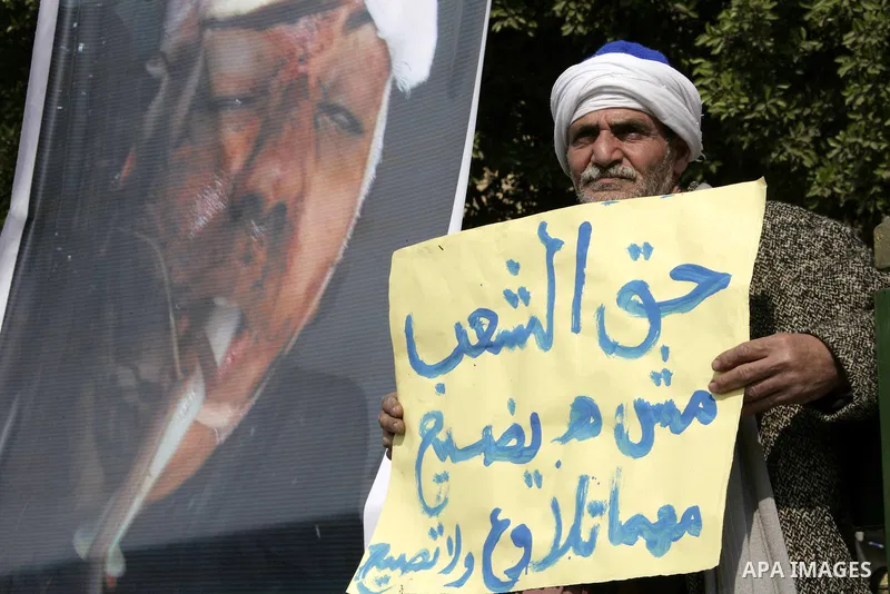Anti-government protesters take part in demonstrations in Tahrir Square in downtown Cairo, Egypt, Tuesday, Feb. 8, 2011. Protesters appear to have settled in for a long standoff, turning Tahrir Square into a makeshift vi...
