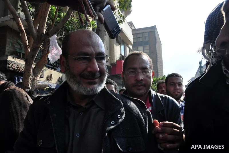 Anti-government protesters take part in demonstrations in Tahrir Square in downtown Cairo, Egypt, Tuesday, Feb. 8, 2011. Protesters appear to have settled in for a long standoff, turning Tahrir Square into a makeshift vi...