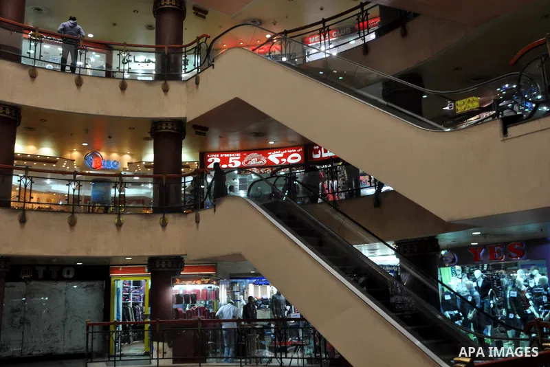 Egyptians shop at a mall in Cairo, Egypt, Tuesday, Feb. 8, 2011. Protesters appear to have settled in for a long standoff, turning Tahrir Square into a makeshift village with tens of thousands coming every day, with some...