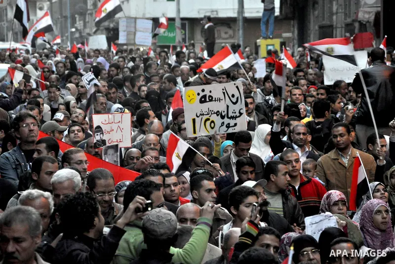 Egyptian anti government protesters gather in Alexandria, Egypt, on 08 February 2011, the 15th consecutive day of thousands of people protesting against Egypt's president Hosni Mubarak. Photo by Ahmed Ramadan