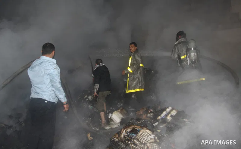 Palestinian firefighters try to extinguish a fire at a burning medicine warehouse in Gaza City, Wednesday, Feb. 9, 2011. Early Wednesday, Israeli aircraft carried out air strikes against four targets including Hamas and...