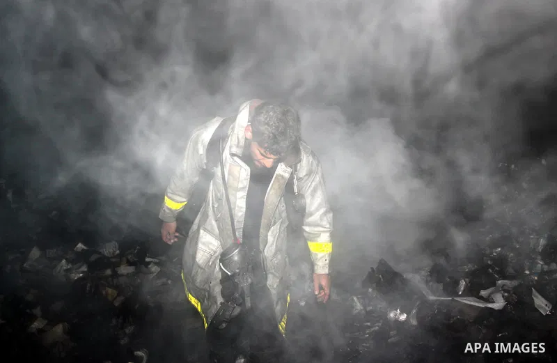 Palestinian firefighters try to extinguish a fire at a burning medicine warehouse in Gaza City, Wednesday, Feb. 9, 2011. Early Wednesday, Israeli aircraft carried out air strikes against four targets including Hamas and...