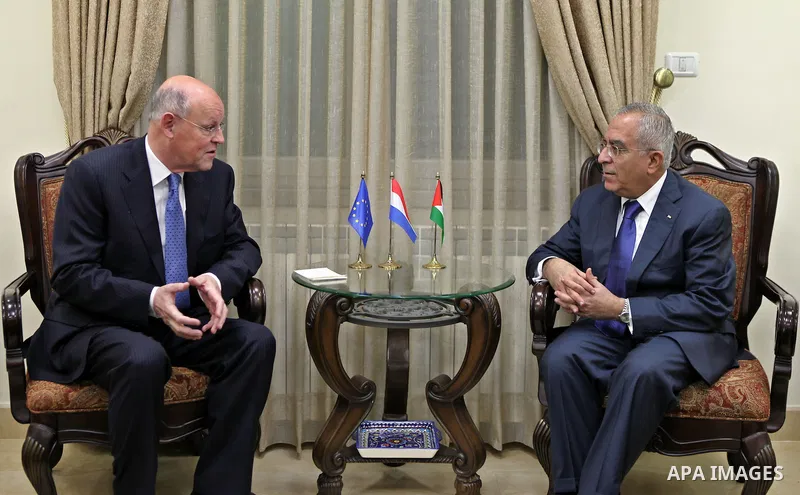 Palestinian Prime Minister Salam Fayyad during his meeting with the Netherland Minister of Foreign Affairs, Uri Rosenthal in the West Bank city of Ramallah on Feb. 9,2011. Photo by Mustafa Abu Dayeh