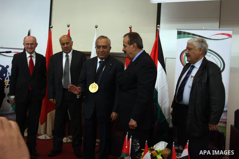 Palestinian Prime Minister Salam Fayyad attends the opening of the Arab Media Forum Sports first in Palestine in West Bank city of Ramallah on February 9, 2011. Photo by Issam Rimawi