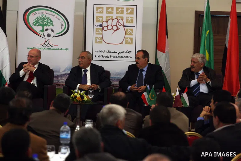 Palestinian Prime Minister Salam Fayyad and Wilfred to Makki, Assistant Secretary General of the United Nations during the opening of the Arab Media Forum Sports first in Palestine in West Bank city of Ramallah on Februa...