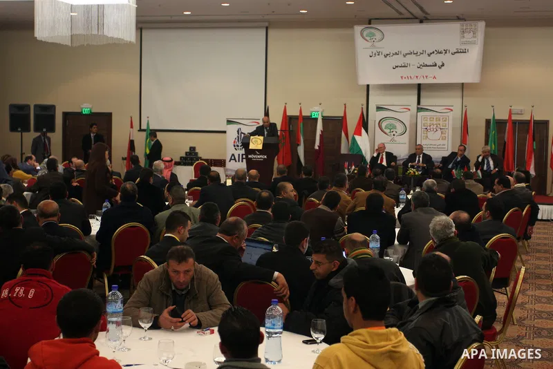 Palestinains attend the opening of the Arab Media Forum Sports first in Palestine in West Bank city of Ramallah on February 9, 2011. Photo by Issam Rimawi